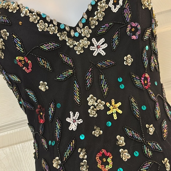 Promdress worn once . Beautiful beading and sequins thru out altered to fit 5’2 - Picture 4 of 9